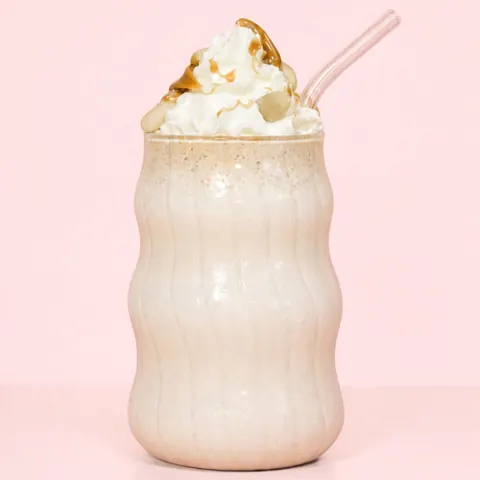 Peanut Butter Milkshake at WEPE, Pererenan, Bali. Peanut butter milkshake with cream, peanut drizzle and peanuts