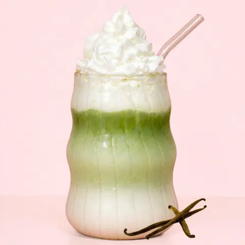Vanilla Matcha at WEPE, Pererenan, Bali. Matcha layered over vanilla milk and ice, topped with whipped cream